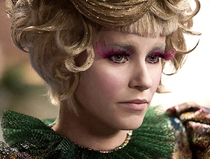 Elizabeth Banks as Effie Trinket.